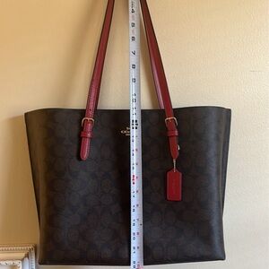 Coach purse with red straps